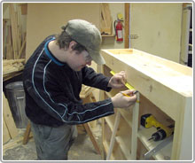 Photo of man doing carpentry